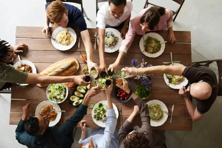 People sharing a meal around a table.
